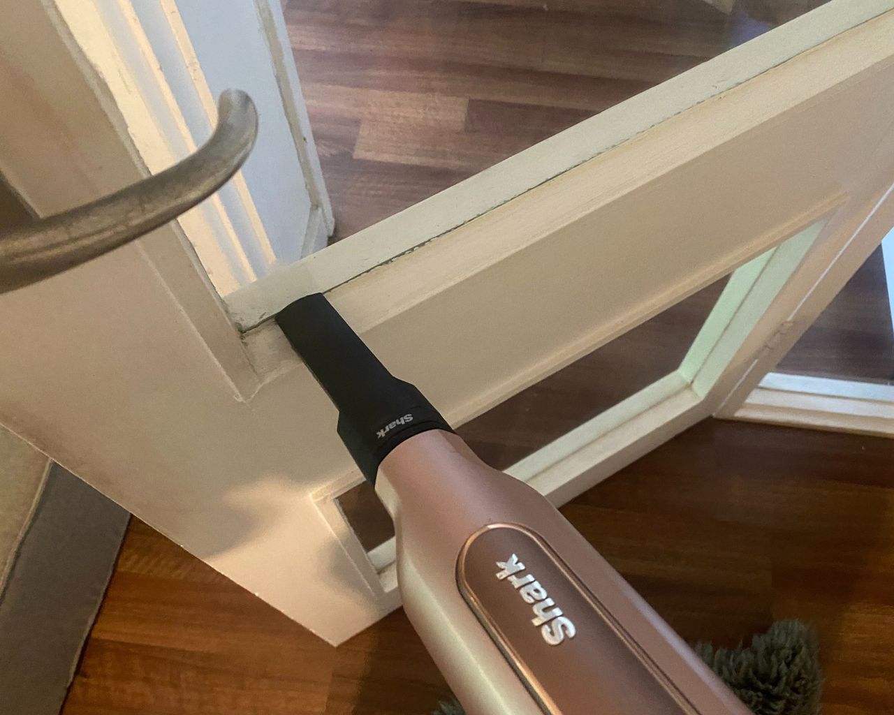 Shark Wandavac crevice tool cleaning door frame ledge