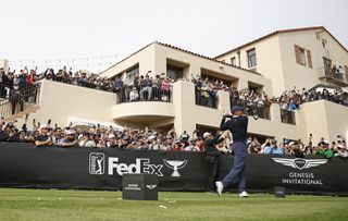 Tiger Woods hits his opening tee shot at the 2023 Genesis Invitational