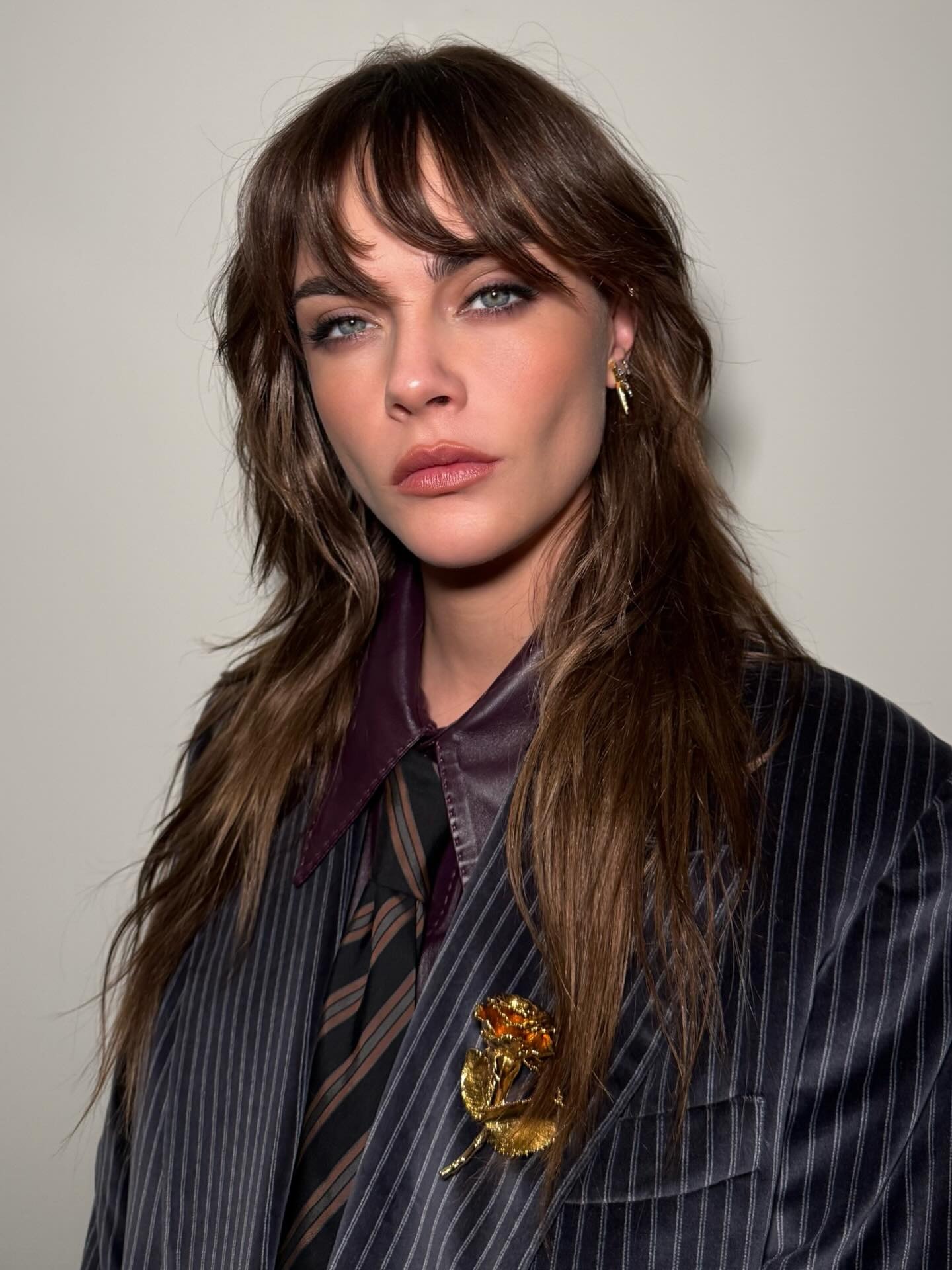 An image of Cara Delevingne with bangs.