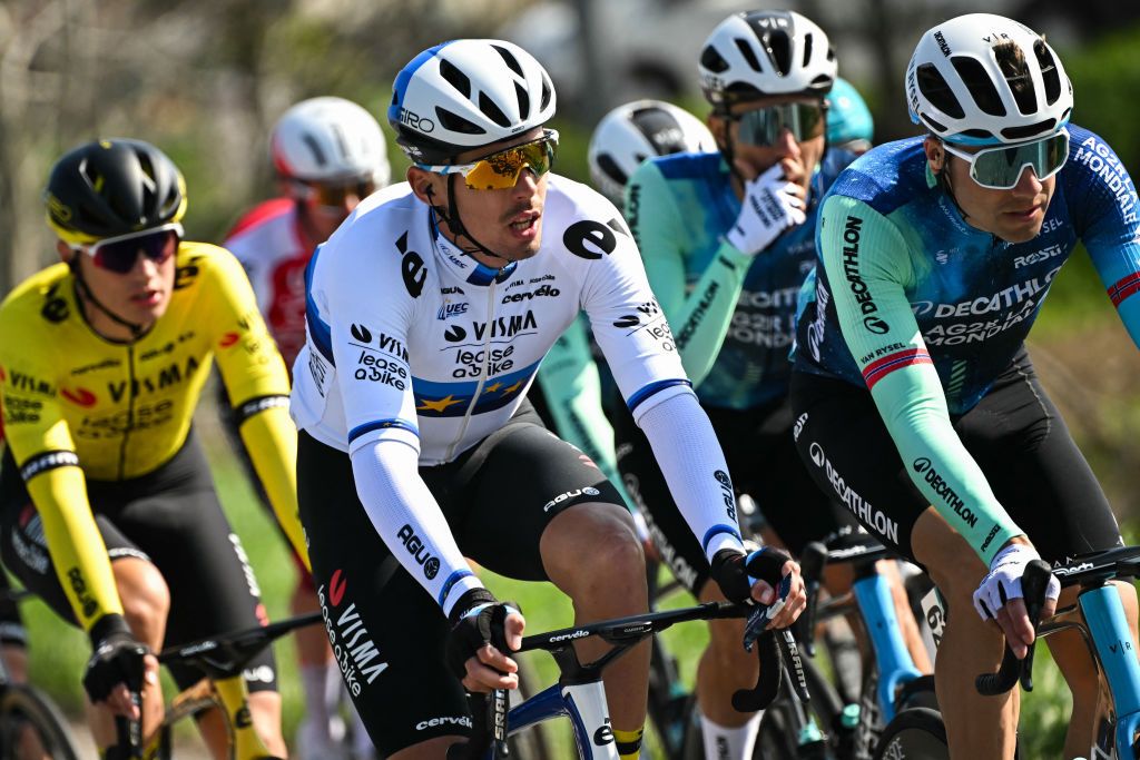 Team Visma-Lease a Bike's French rider Christophe Laporte (C) cycles during the 115th Milan-SanRemo one-day classic cycling race, between Pavia and SanRemo, on March 16, 2024. (Photo by Marco BERTORELLO / AFP)