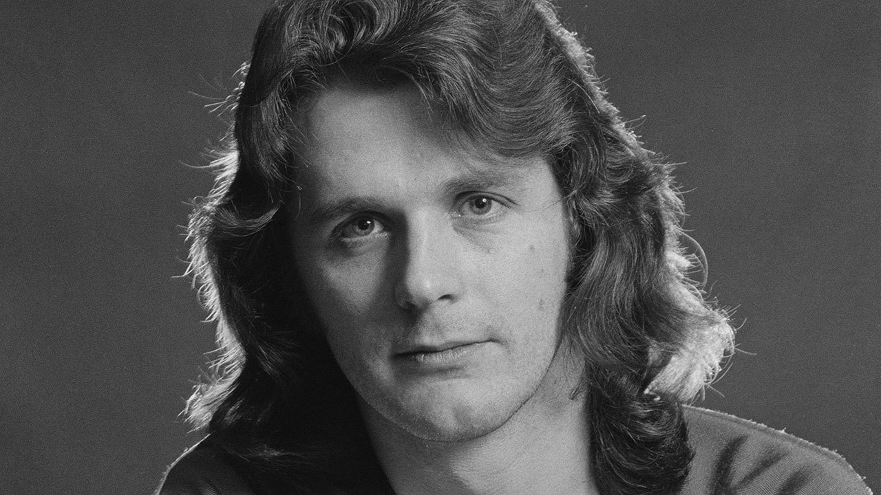 a portrait of john wetton