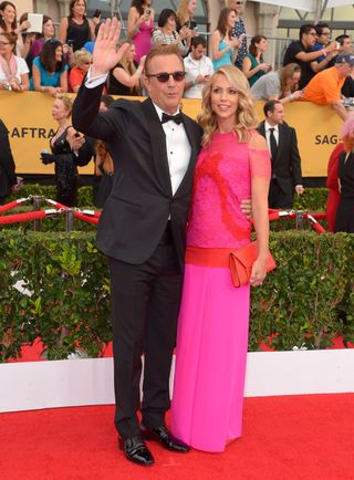 Kevin Costner & Christine Baumgartner At The Screen Actors Guild Awards 2015