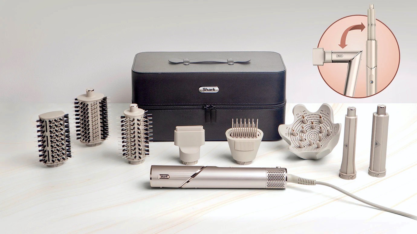 The Shark FlexStyle and its attachments arranged in from of its carry case