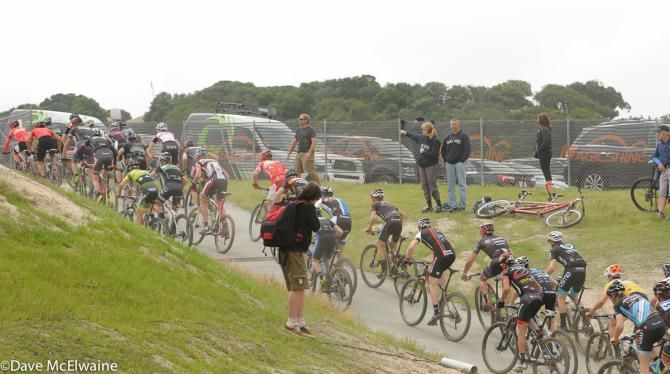 Riders climbing out of the venue on pavement