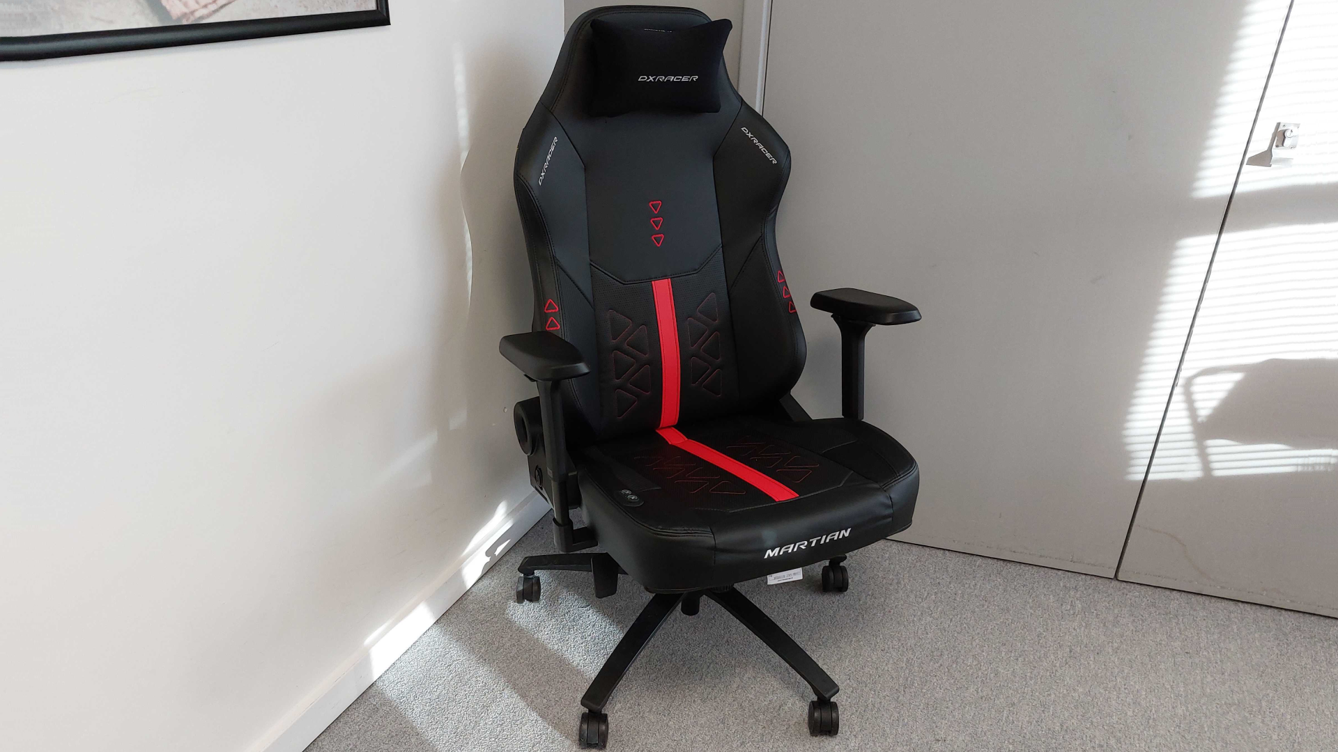 The XL edition of the DXRacer Martian gaming chair as seen in a sunny meeting room.