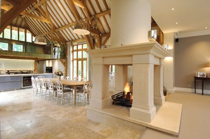 Different layers and sources of lighting designed by Owl Lighting combine to enhance the atmosphere of this barn-conversion project.