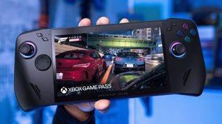 Hand holding Acer Predator Atlas 8 handheld with Forza Horizon 5 gameplay on screen.