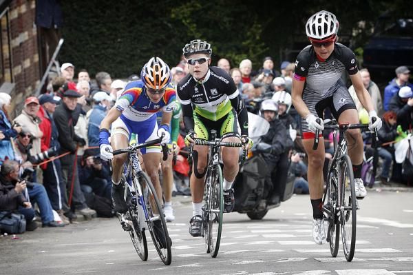 Marianne Vos (Rabo) with the World Cup leader's jersey, battles Evelyn Stevens on the Mur de Huy