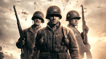 Key art for Company of Heroes: Definitive Edition showing three soldiers, one standing in front and two behind, either side holding rifles.