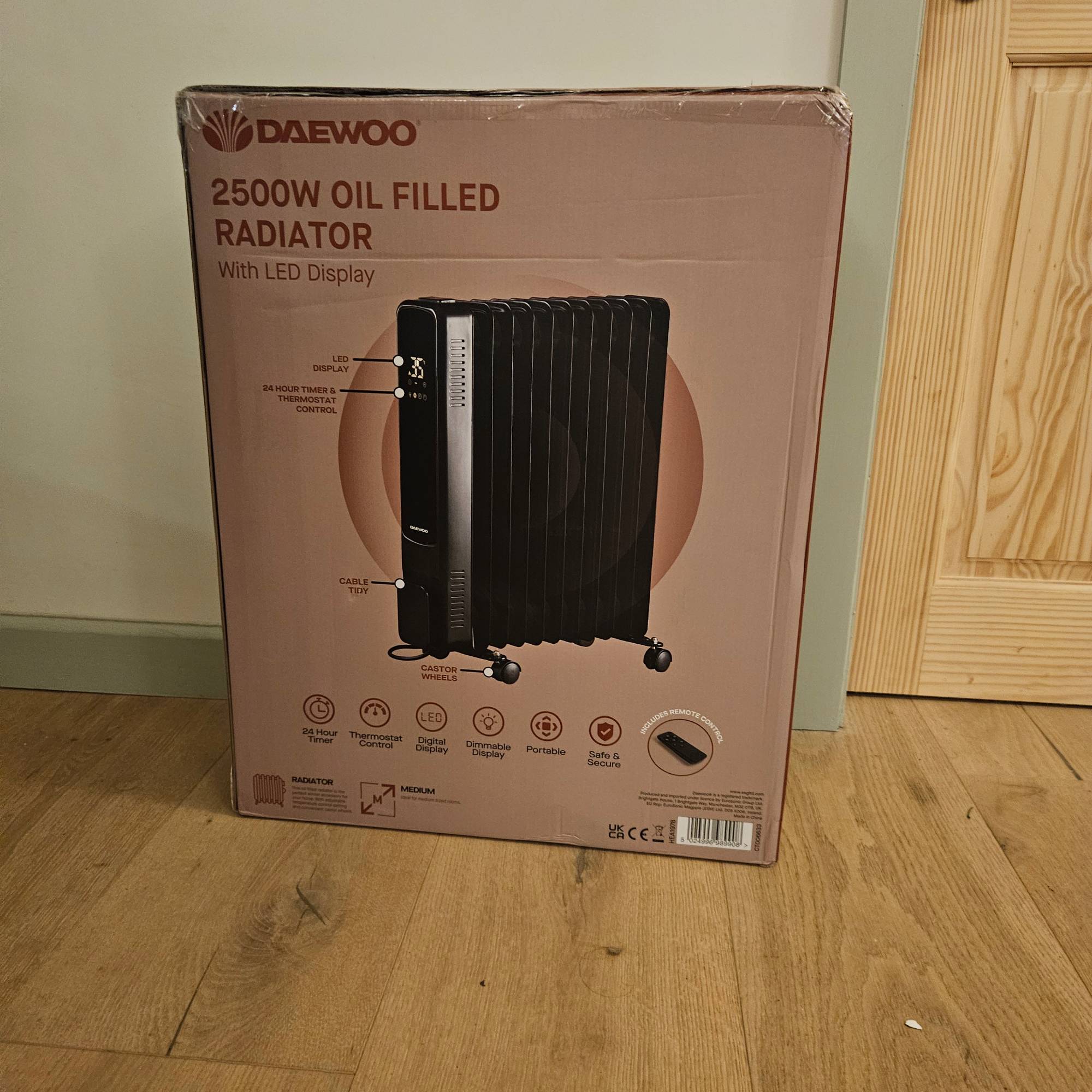 black oil filled radiator from daewoo in packaging