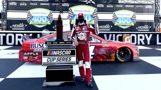 Kevin Harvick celebrates after winning the NASCAR Cup Series Consumers Energy 400 at Michigan International Speedway on August 9, 2020 in Brooklyn, Michigan