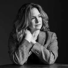 a woman wearing a blazer