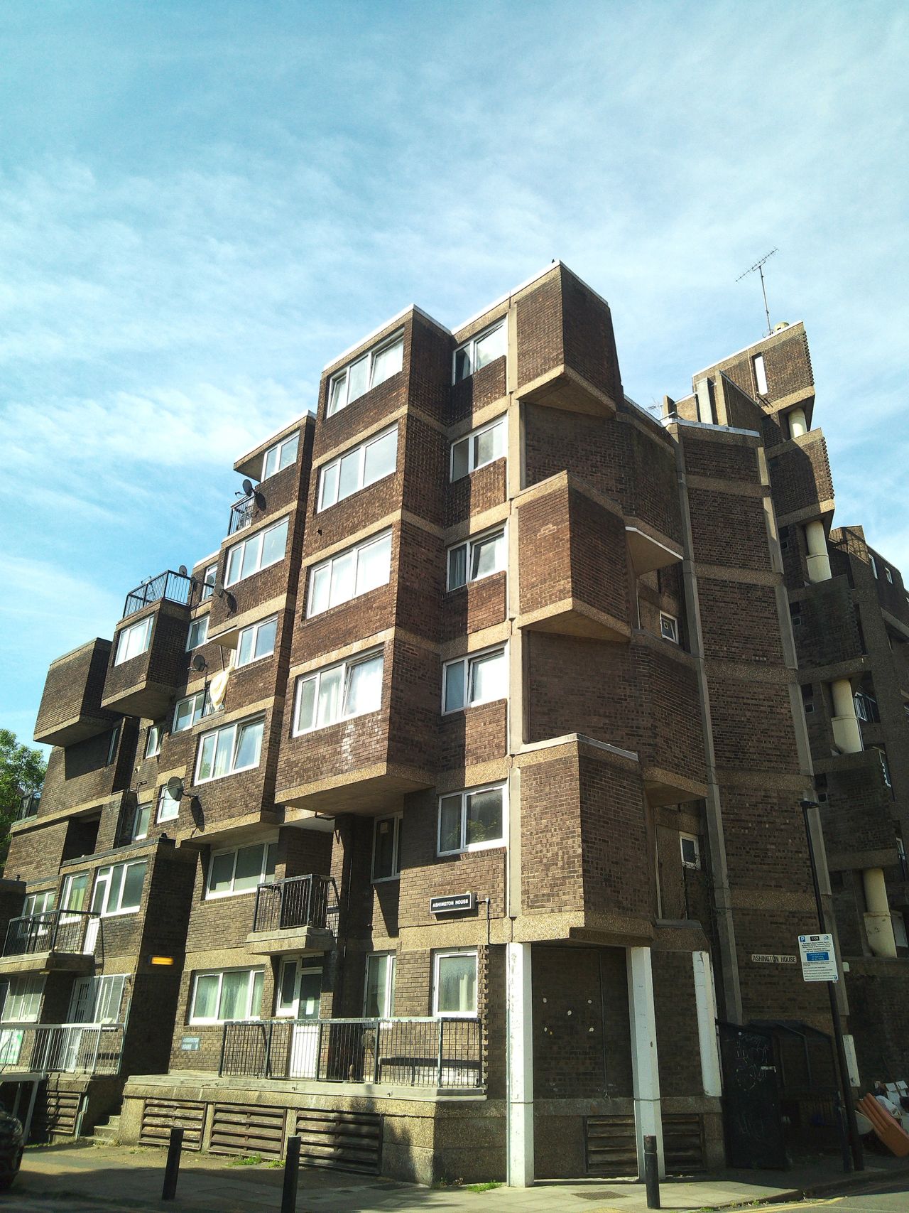 Sample image from Camp Snap CS-Pro digital compact camera showing daytime view of brutalist apartment block