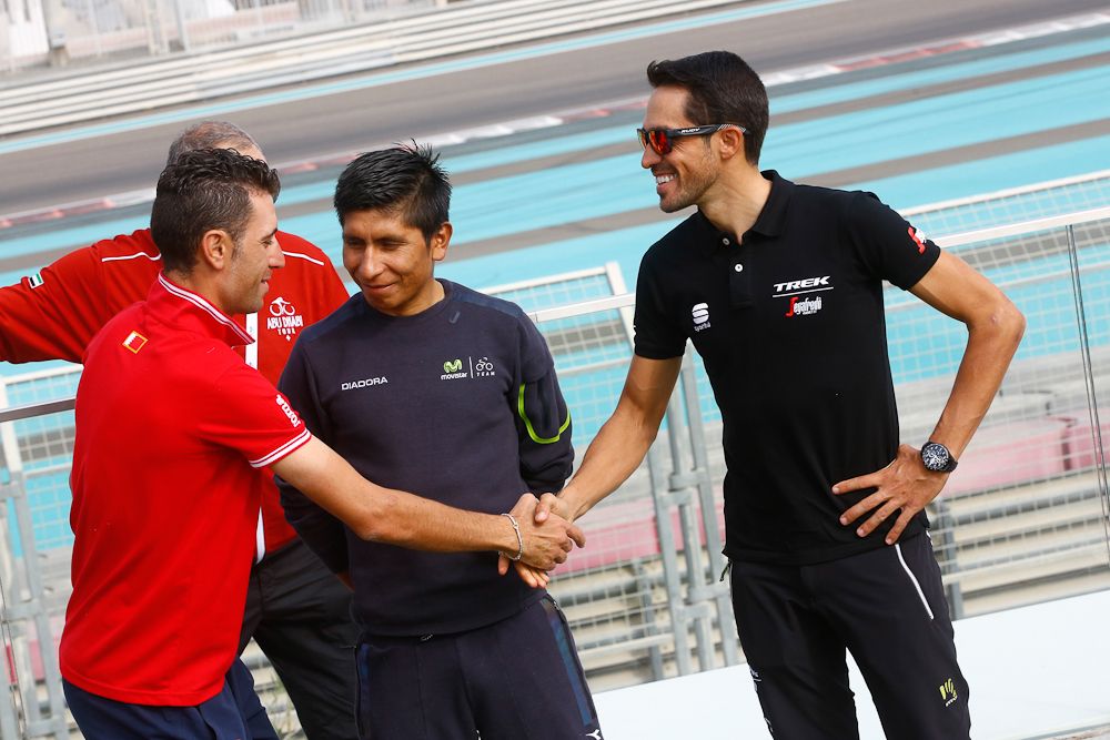 Vincenzo Nibali and Alberto Conatdor greet each other while Nairo Quintana looks on