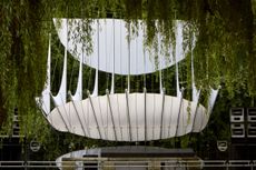 At Dekmantel Festival, a white tent over a stage in the woods