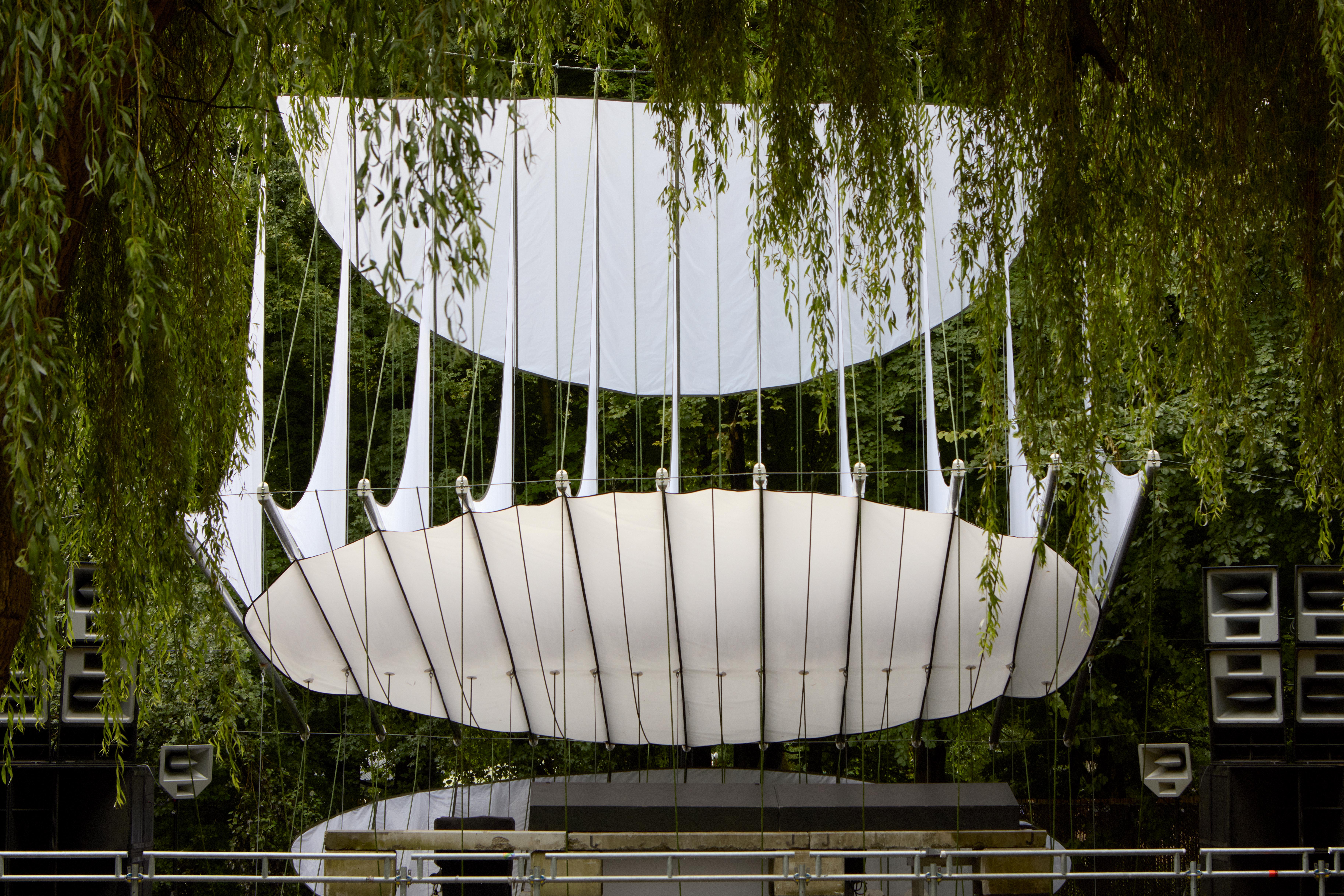 At Dekmantel Festival, a white tent over a stage in the woods