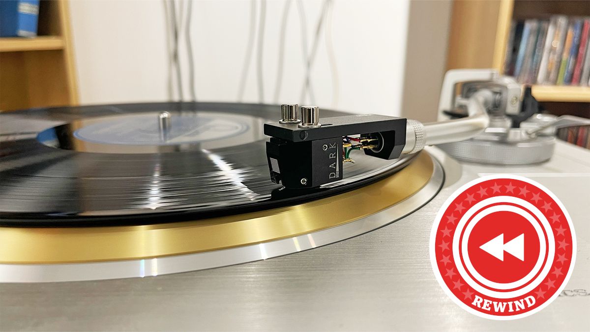 Rewind logo over a turntable