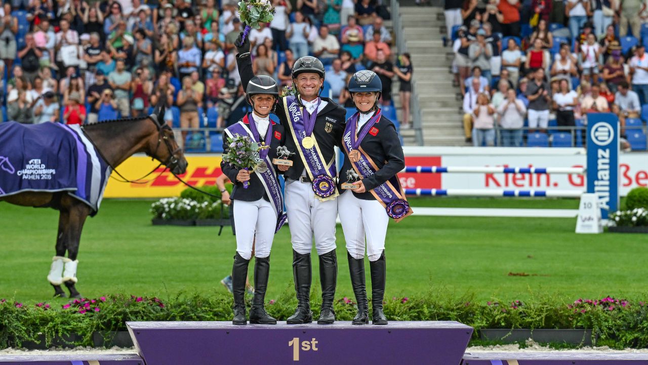 The medal winners on the podium at Aachen world championships