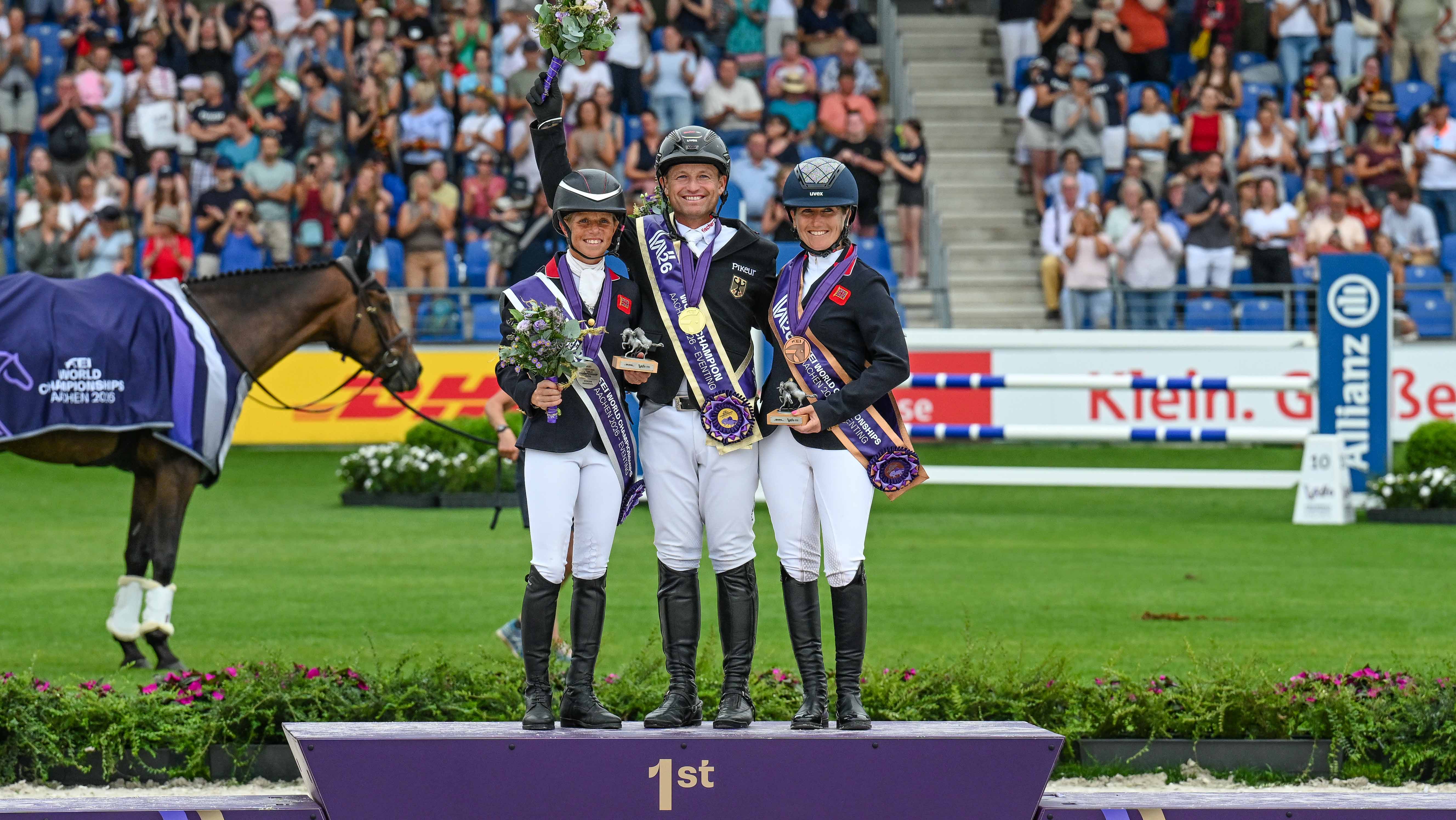 The medal winners on the podium at Aachen world championships