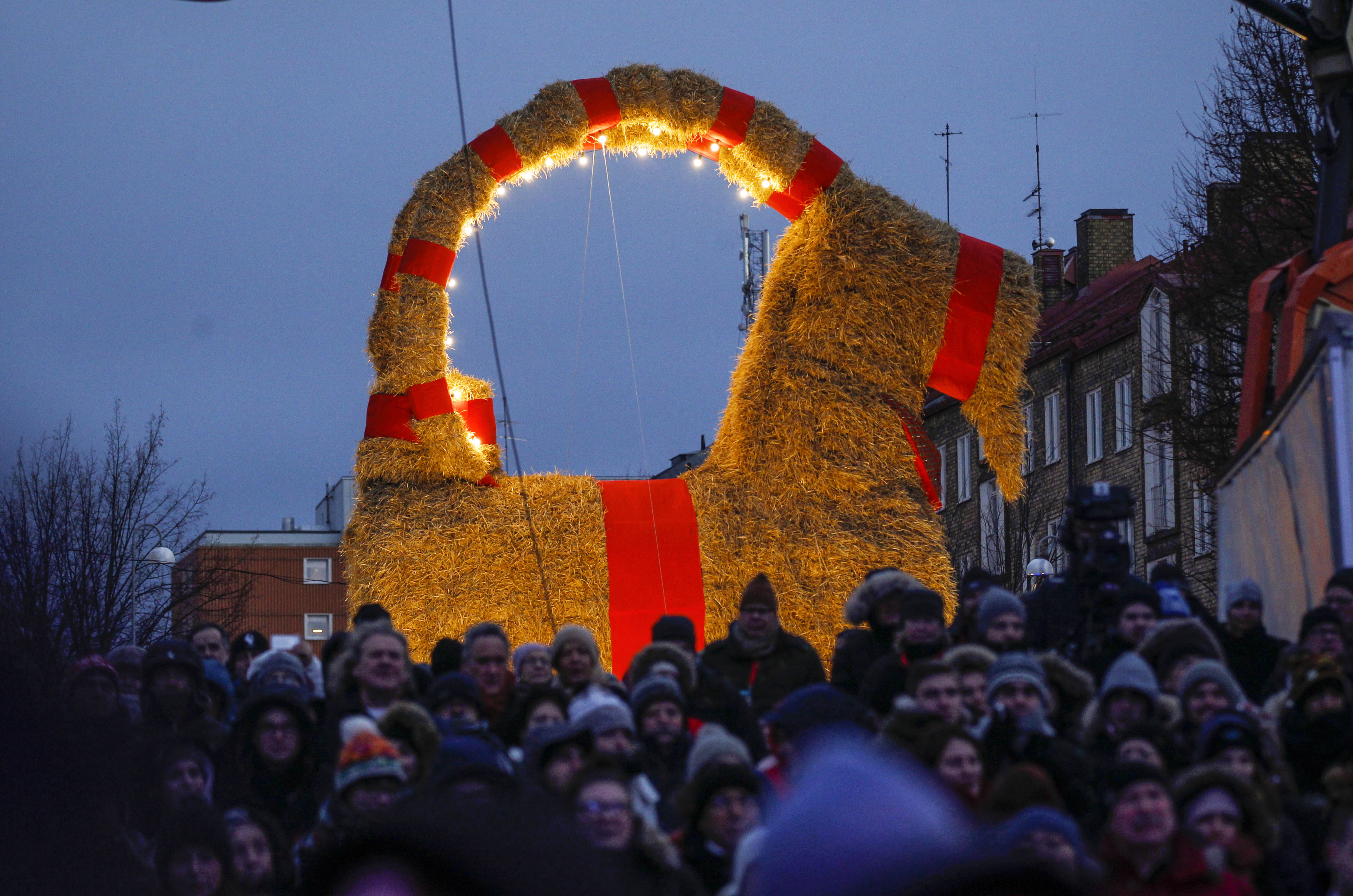 The traditional christmas goat made of straw is inaugurated in Gavle, Sweden on November 27, 2016. To protect the goat this year, which is often the victim of arson, it is equipped with so-called intelligent camera surveillance. via AFP / TT News Agency / Pernilla WAHLMAN / Sweden OUT