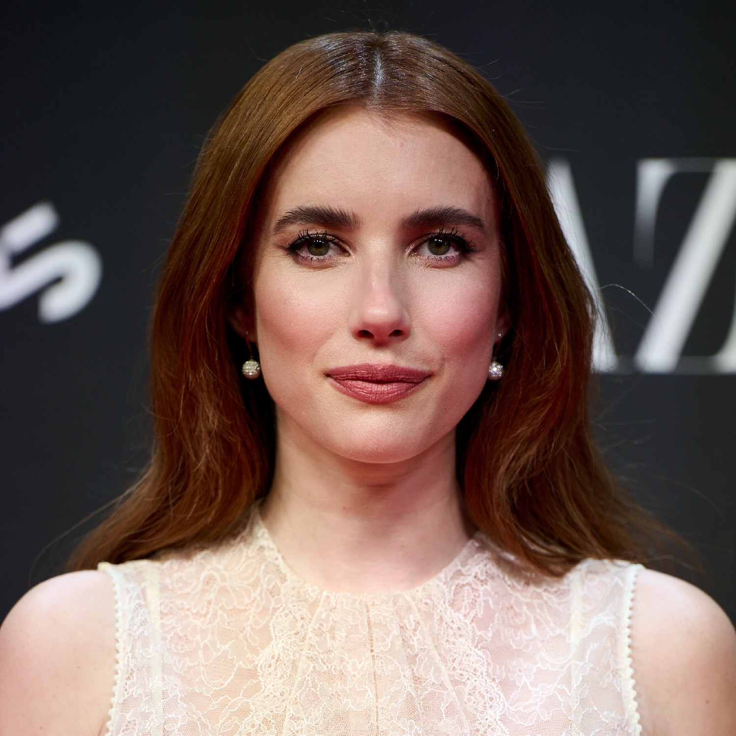 Emma Roberts with reddish-brown hair