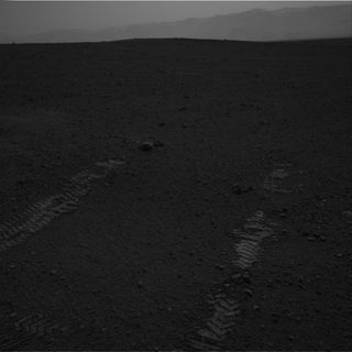 Curiosity's Tire Tracks and Distant Martian Landscape