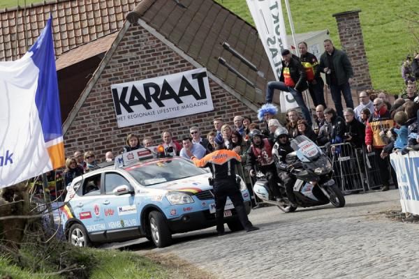 A slight hold up for the Lotto - Belisol team car