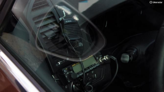 Need a place to hang a race radio? Why, of course the solutio is to screw a hook into the dashboard