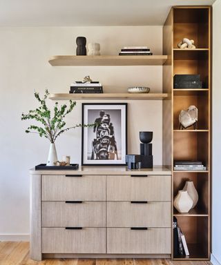 A neutral room with shelving