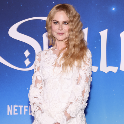 Nicole Kidman attends the premiere of Netflix's "Spellbound" at The Paris Theatre on November 11, 2024 in New York City wearing a white paisley gown and black pumps