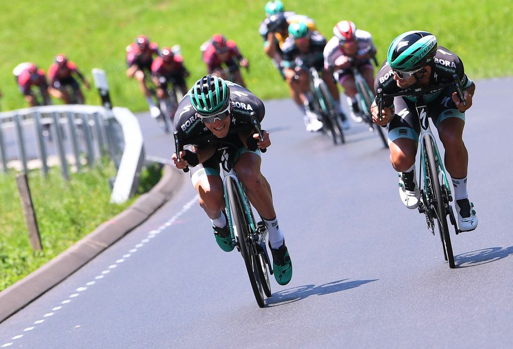 Bora rides tuck on a descent during stage 5 at Tour de Suisse