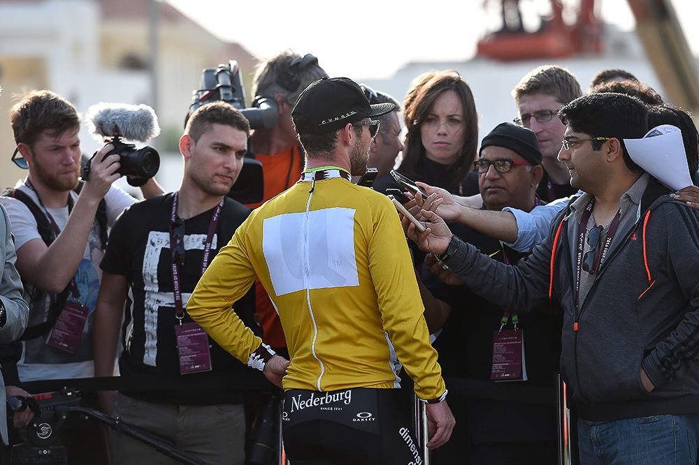 Cavendish talks with the media after winning stage 1 in Qatar