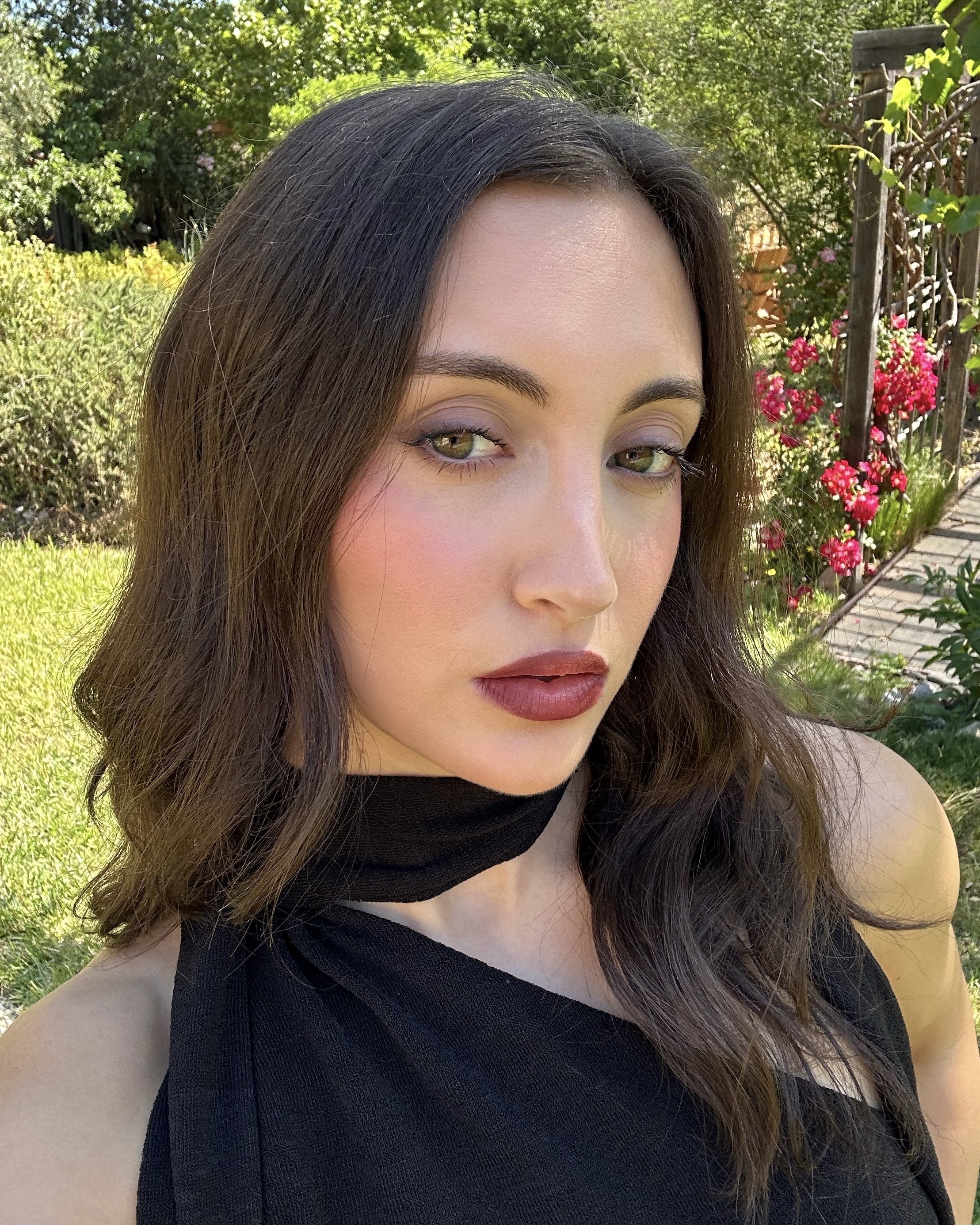 Alyssa Brascia wearing the Hourglass Unreal Liquid Blush in Craft.