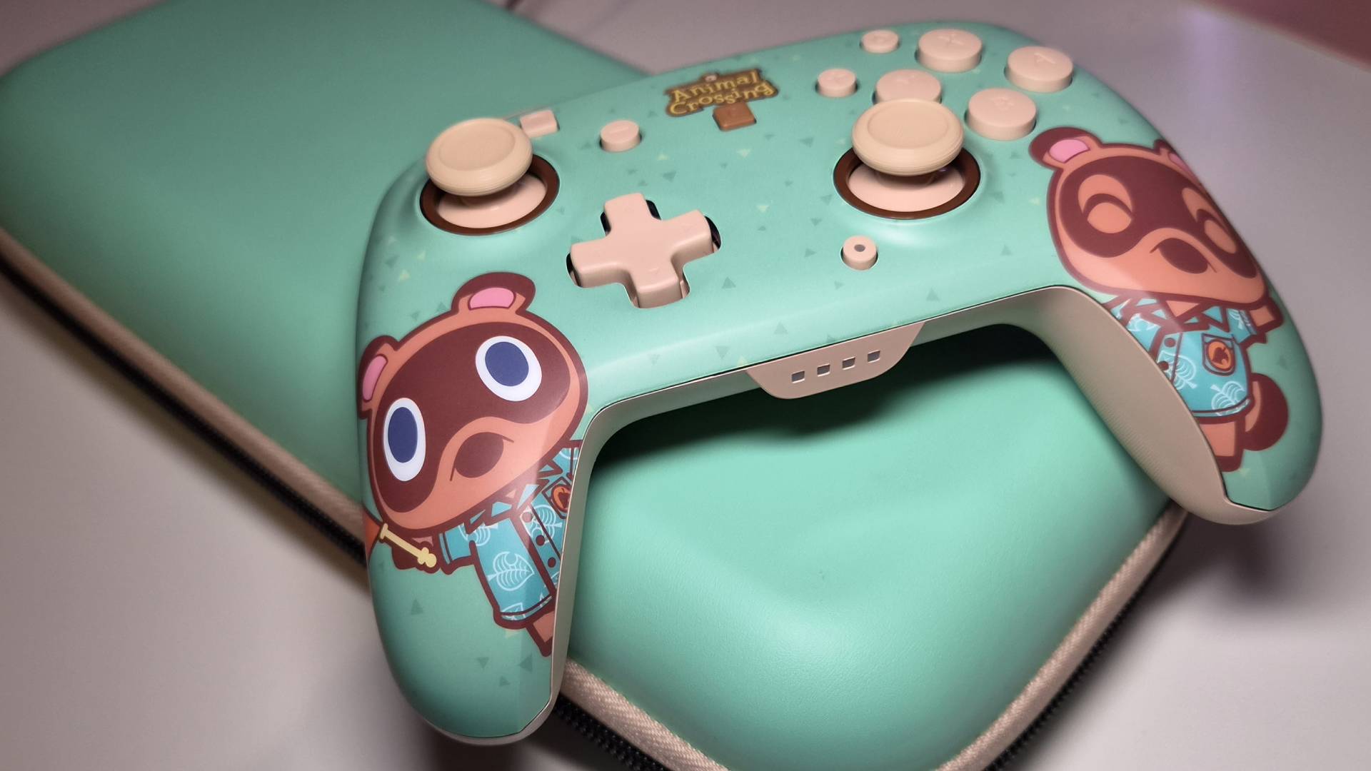 Photo of the Turtle Beach Animal Crossing accessories sitting on a white desk.