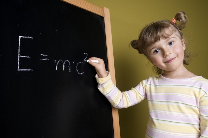 A smart child with E=MC2 equation