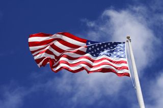 American flag flying high.