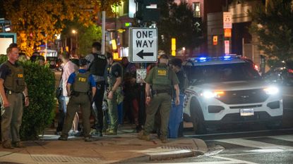 FBI agents patrol Washington, D.C., at night