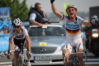Fabian Wegmann (Team Milram) milks the celebrations after beating Karsten Kroon in a sprint.