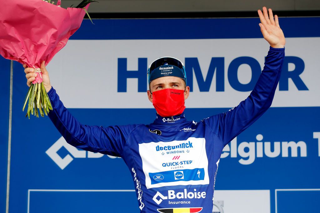 HAMOIR BELGIUM JUNE 12 Remco Evenepoel of Belgium and Team Deceuninck QuickStep Blue Leader Jersey celebrates at podium during the 90th Baloise Belgium Tour 2021 Stage 4 a 1527km stage from Hamoir to Hamoir baloisebelgiumtour on June 12 2021 in Hamoir Belgium Photo by Bas CzerwinskiGetty Images