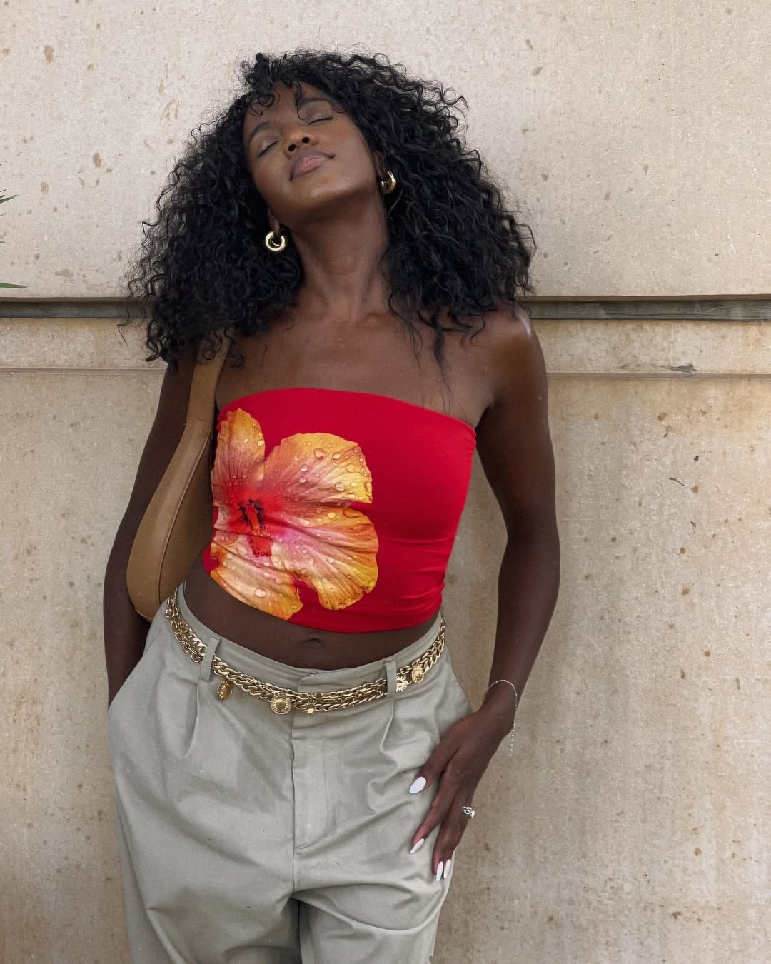 Melissa Reanne Johnson shows off her glossy and bouncy natural curls.