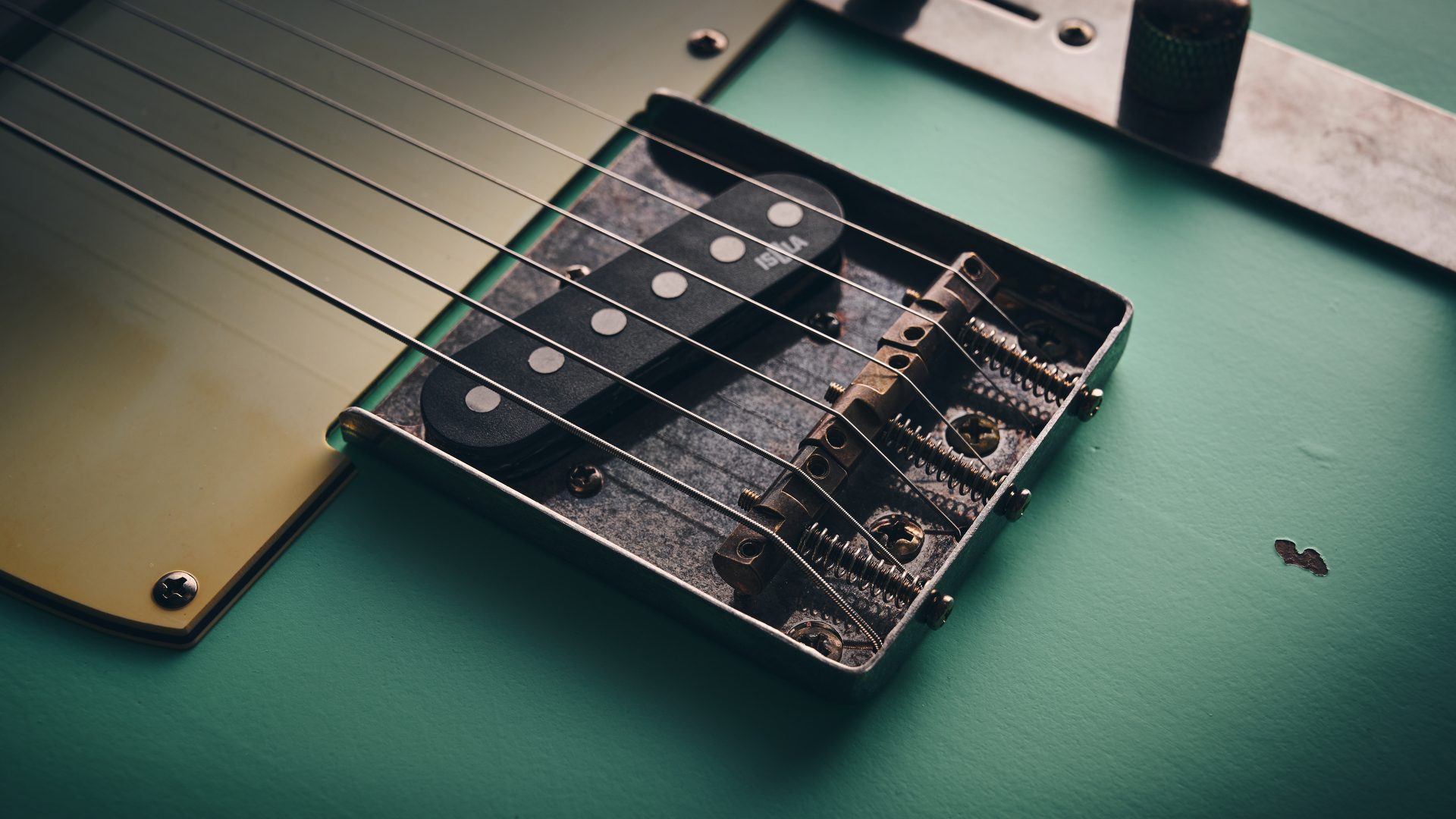 The bridge and bridge pickup of the Harley Benton TE-62LA electric guitar