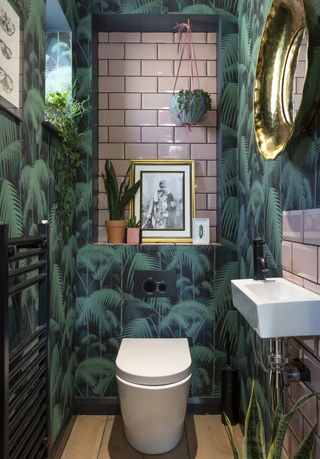 Cloakroom with jungle wallpaper