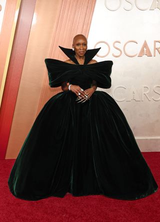 Cynthia Erivo clad in a collared black velvet ballgown at the 2025 Oscars.