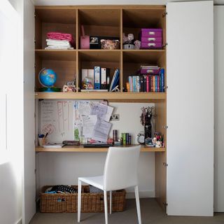 Study area in teenagers white bedroom