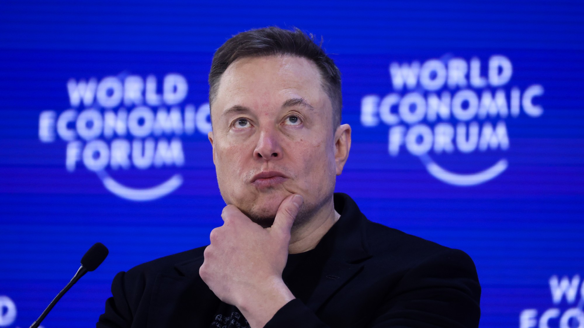 Elon Musk looking thoughtful