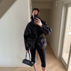 sarah wearing black outfit