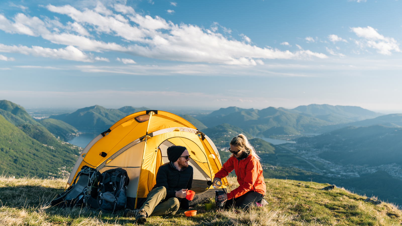 Couple camping in the wild