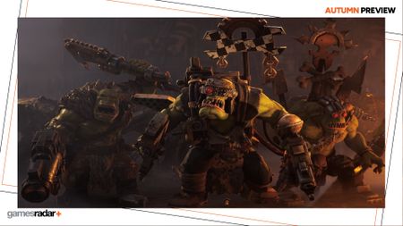 Warhammer 40,000 Dawn of War 4 screenshot showing armored orcs surrounded by the Autumn preview GamesRadar+ banner