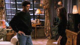 Ross and Rachel looking devastated with each other in Friends