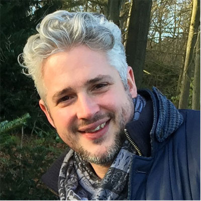 headshot of founder of The Main Company Alex Main
